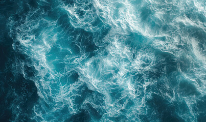 Obraz premium Aerial view to ocean waves. Blue water background