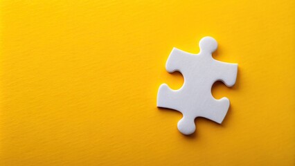 Obraz premium High angle view of white puzzle pieces on yellow background