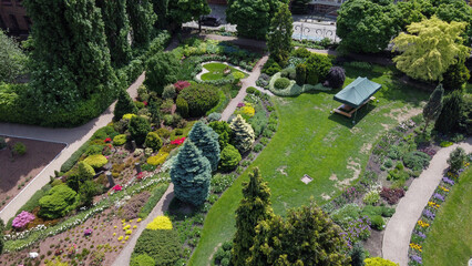 Garden pathes in Botanical garden in Wroclaw  and grass and flowers in fantastic May