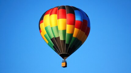 Naklejka premium A colorful hot air balloon soaring against a clear blue sky.