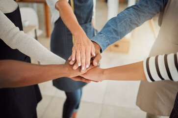 Fashion, tailor and hands of people in huddle for mission, support and design startup together. Workshop, closeup and designers with gesture for manufacturing industry, textile production or teamwork