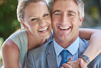 Happy, hug and portrait of mature couple in backyard fir bonding, affection and love outdoors. Marriage, professional clothes and man and woman embrace for affection, relationship and commitment