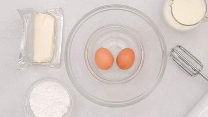 Cream cheese whipped cream recipe. Ingredients close-up on a kitchen table