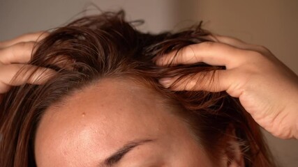 Pre-wash scalp and hair oiling. Scalp massaging with hands. Pre-shampoo treatment. Hair loss