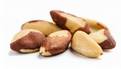 Heap of brazil nuts isolated on white backdrop. Healthy and tasty snack. Super food.