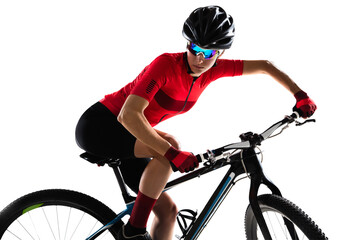 Side view. Portrait of female professional cycling athlete, young woman on road bicycle practicing...