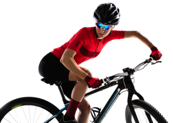 Side view. Portrait of female professional cycling athlete, young woman on road bicycle practicing against transparent background. Concept of sport, action, motion, speed, race. Copy space for ad