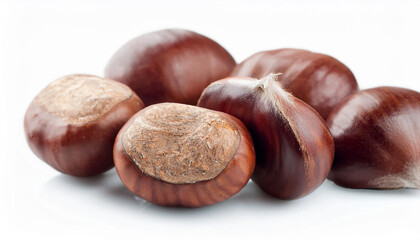 Obraz premium Heap of chestnuts isolated on white backdrop. Healthy and tasty snack. Super food.
