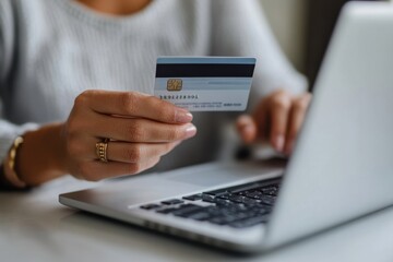 Fototapeta premium Using a credit card while shopping online is convenient and secure