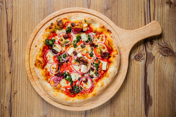 italian pizza on the wooden board