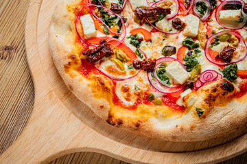 italian pizza on the wooden board
