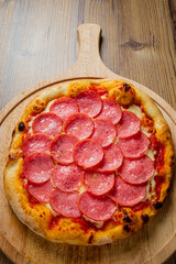 italian pizza on the wooden board