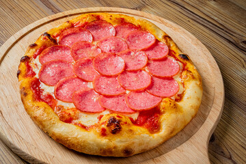 italian pizza on the wooden board