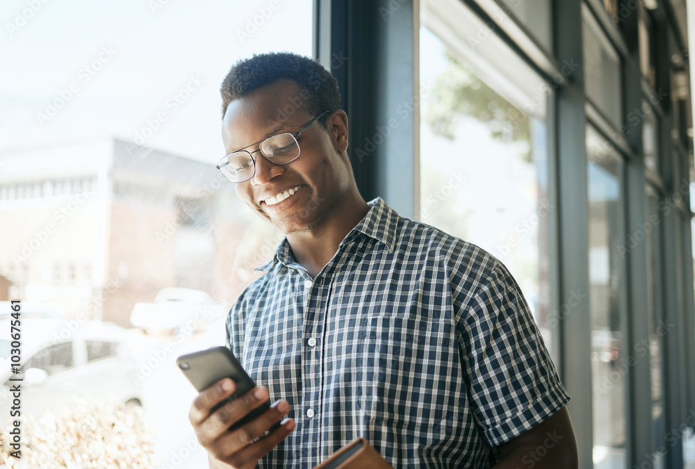 Poster Business, black man and smile with phone in office for text message, checking notifications and networking. Professional, employee and happy with smartphone at workplace for communication and email