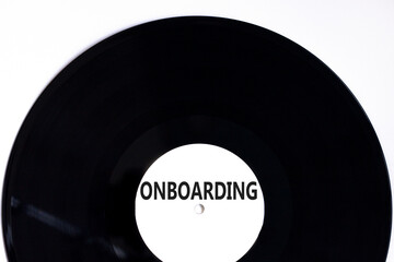 Onboarding success symbol. Concept word Onboarding on beautiful black white vinyl disk. Beautiful...