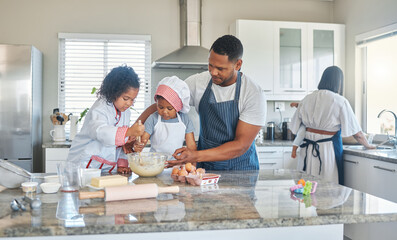 Family, children and mix dough for baking, teaching and help with flour in bowl. Mother, father and kids learning cooking with food for support, development and people prepare dessert in home kitchen