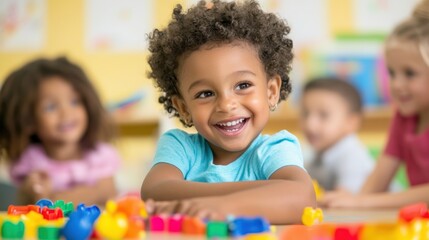 Fototapeta premium Smiling girl playing with colorful toys.