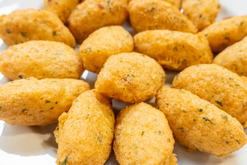 portuguese traditional fried cod fish croquette snack, bolinhos de bacalhau