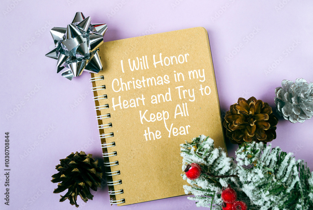 Poster notebook with a christmas tree on top of it