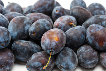 Fresh plums background. Top view. Organic food.