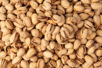 Tasty pistachios isolated on a white background.