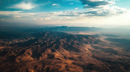 Fototapeta premium Aerial view of the deserts of northern Mexico with space for copy in the sky