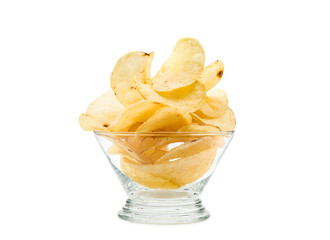Potato chips pile into transparent glass bowl on white background.