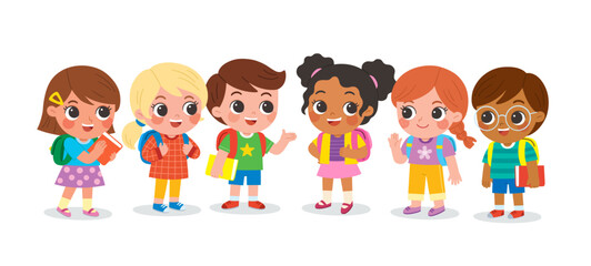 Group of elementary school children standing in the classroom and talking to each other.  Cute kids communicating with each other. Happy boys and girls meet and make friends at school.