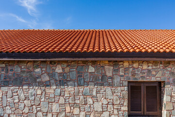 Clay tile roof on an old stone house