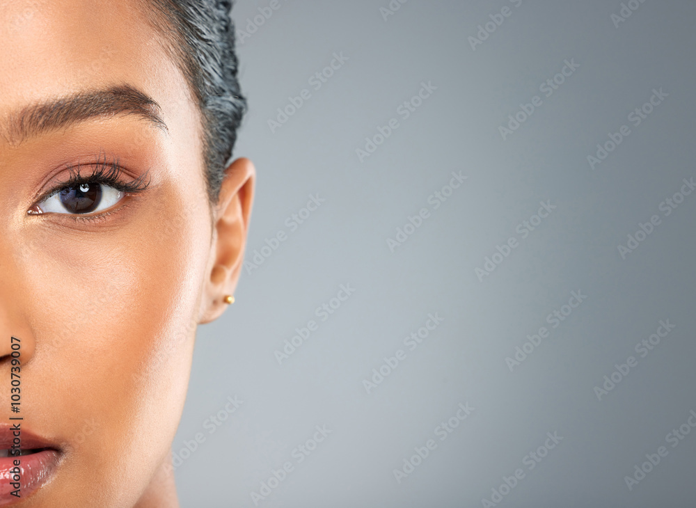 Poster Woman portrait, beauty and half face in studio, makeup transformation and dermatology on gray background. Female person, mockup space and serious cosmetics for aesthetic, facial treatment and change