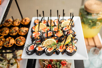 Festive buffet. Table with desserts in glass and snacks. Catering. Buffet. Self-service. Hotel and restaurant services. Wedding buffet