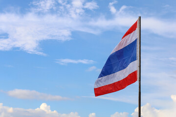 The thailand flag on wood pole have sky background