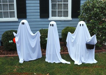 Three White Ghosts Trick=Or-Treating on Halloween