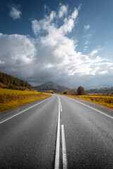 country road in autumn mountain landscape