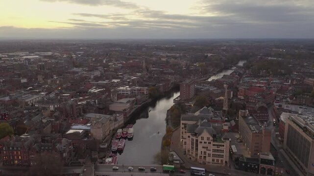 Aerial shot of York cityscape with buildings and River Ouse in York, UK at sunrise