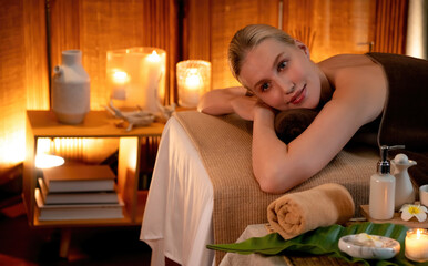 Caucasian woman customer enjoying relaxing anti-stress spa massage and pampering with beauty skin...