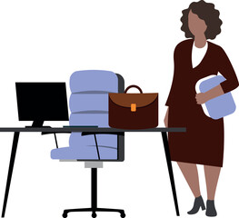 Businesswoman standing beside office desk