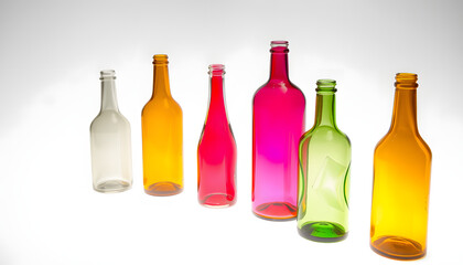 colorful glass bottles isolated with white highlights, png