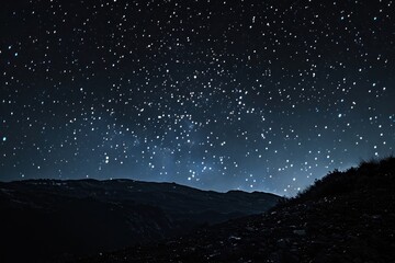Naklejka premium Starry night sky over mountains