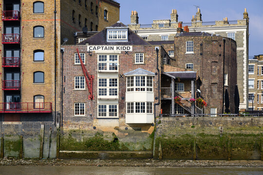 London, UK - September 19, 2024; Captain Kid pub riverside facade from River Thames with sign