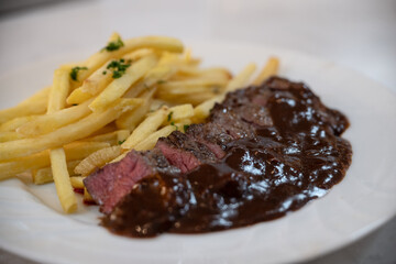 grilled steak with fries