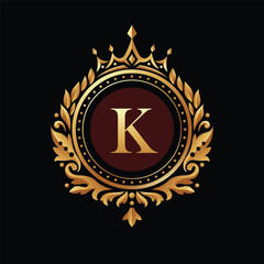 Fototapeta premium Letter K inside a circle frame and crown with vintage ornament in golden color