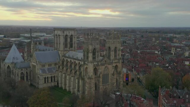 Drone shot of York Minster and surrounding cityscape at sunrise in York, England, UK