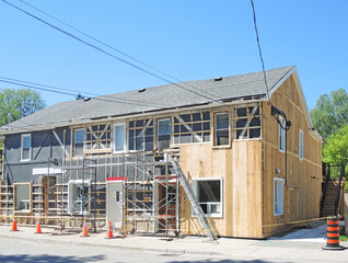 Installing siding around the house