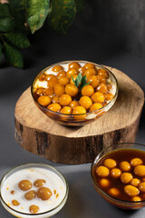 Candil porridge, with balls of sticky rice flour, drizzled with brown sugar sauce and coconut milk