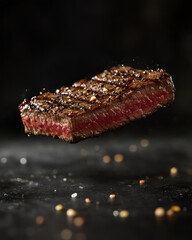 Perfectly Seared Steak: A mouthwatering close-up of a perfectly seared steak, suspended in mid-air above a bed of black peppercorns.