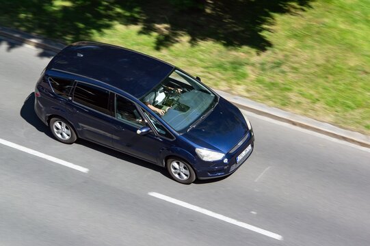 Blue Ford S-Max Mk1 MPV family car with motion blur effect
