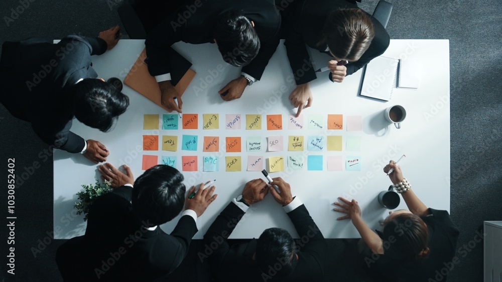 Poster top down aerial view of manager discuss and choose marketing idea from sticky notes. group of busine