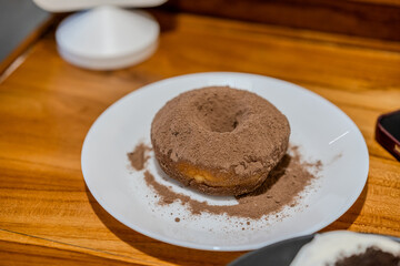 Donut with chocolate powder