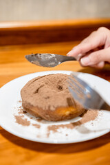 Donut with chocolate powder